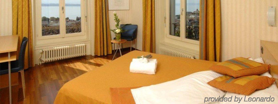 Hotel Alpes & Lac Neuchâtel Rum bild